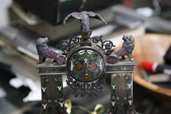 A good late 19th/early 20th century Austro-Hungarian silver gilt, polychrome enamel, lapis lazuli and gem set mantel timepiece.